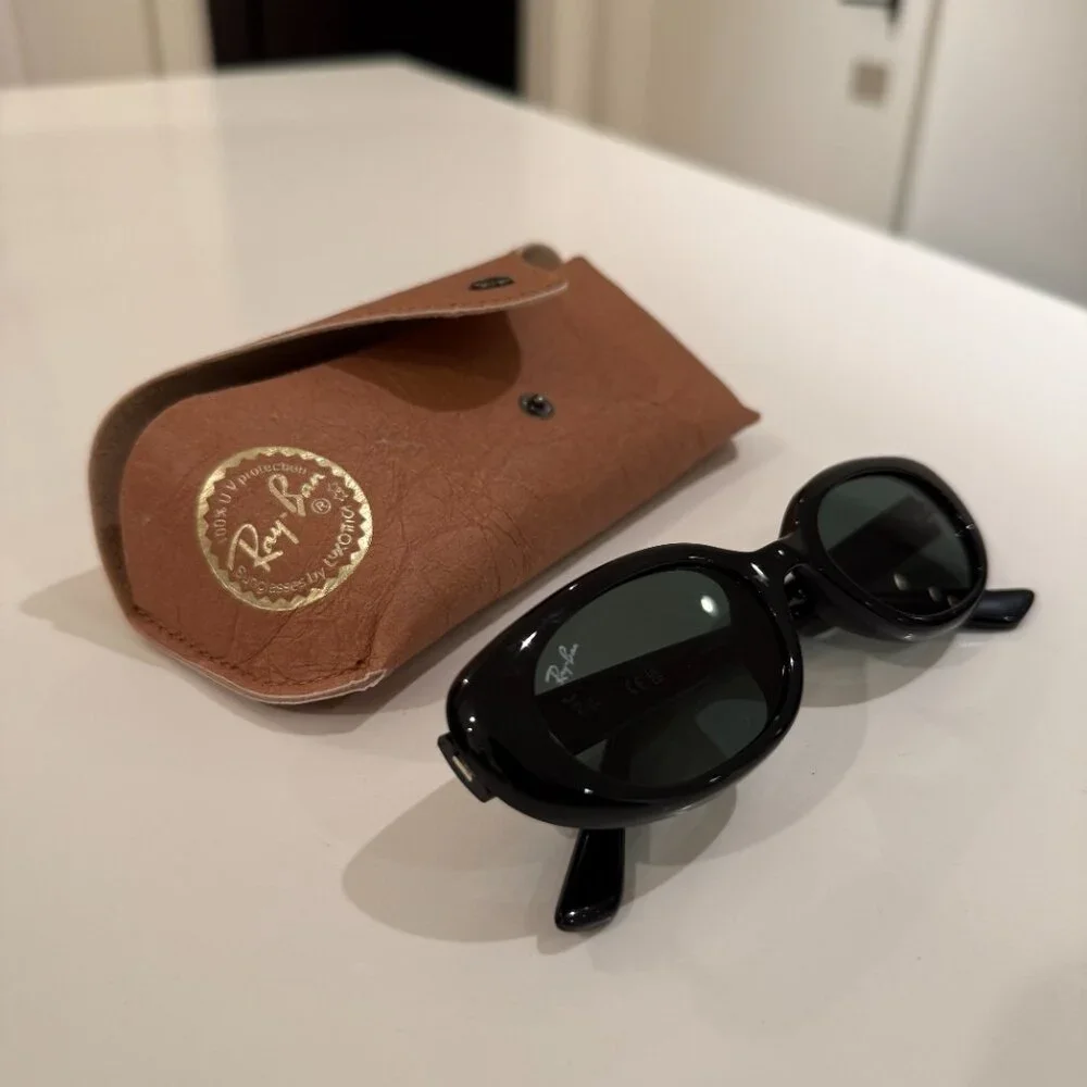 Ray-Ban Black Oval Sunglasses with Dark Green Lenses